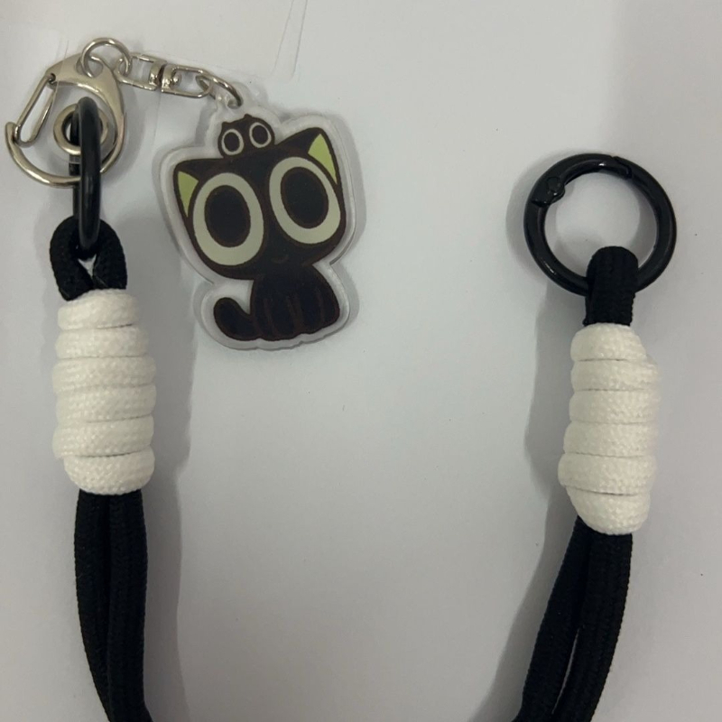 スタイリッシュな黒猫をモチーフにした盗難防止・落下防止機能付 - Phone Accessories Hanger のレビューと価格